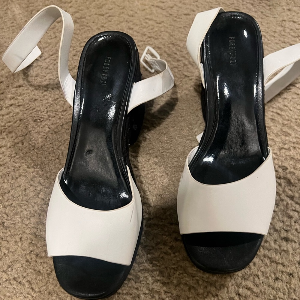 Black and white platform heels